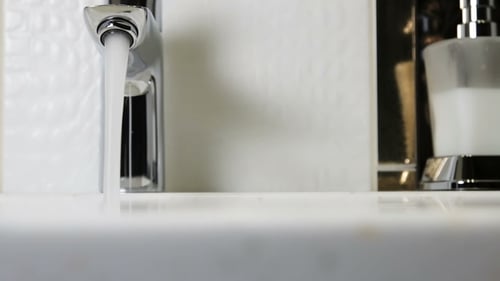 Water Faucet in a Luxurious Hotel Room or at Home