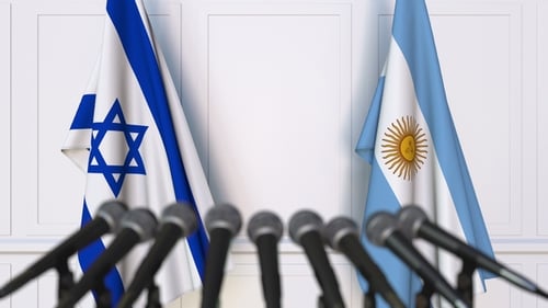 Flags of Israel and Argentina at International Press Conference