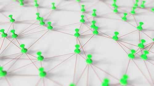 Green Pushpins and Threads Compose a Network on a Pinboard