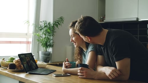 Couple Enjoying a Video Call on Laptop
