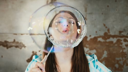 Woman Blowing Bubbles Inside
