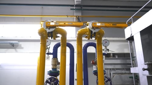 Industrial Factory. Various Mechanisms and Metal Pipes