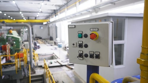 Industrial Factory with Various Mechanisms and Metal Pipes