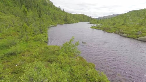 Flying over Freshwater Lake in the Mountain