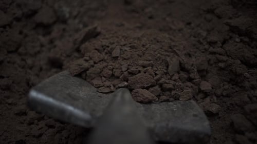 To Dig in the Shovel. Footage. Soil with Shovel View of a Shovel. , Shallow DOF. Digging Spring Soil
