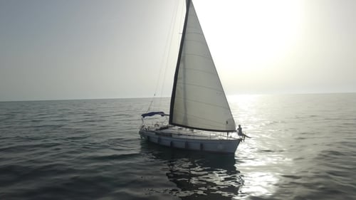Luxury Boat Traveling on Sea Footage. Sailboat Anchored