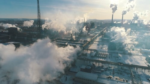 Industrial Smoke From the Plant Pollutes the Air