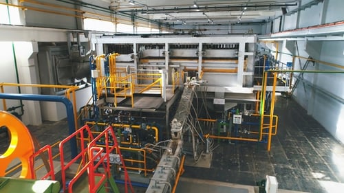 Industrial Factory. Various Mechanisms and Metal Pipes