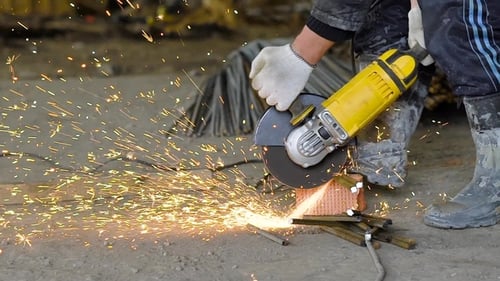 Working on a Contruction Site Builder Using Special Tools