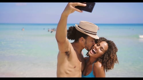 Couple Taking Selfie on Beach