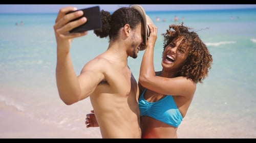 Happy Couple Taking Selfie on Tropical Beach
