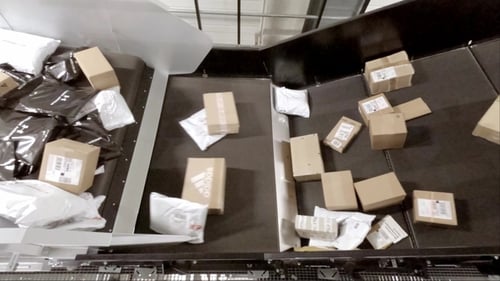 Huge Amount of Parcels Bein Transported on Conveyor Belts