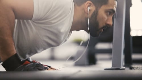 Man Doing Push-Ups in Gym During Daytime