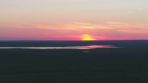 Aerial View of Beautiful Emerald Green Water Lake and Summer Landscape Sunset Sunset on the Lake