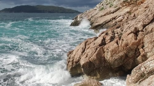 Pure Blue Waters Sea, Coastal Waves Breaking And Splashing Adventure On Sea Coast Surf Rocks