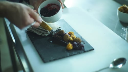 the Chef Decorates the Dessert with Truffles