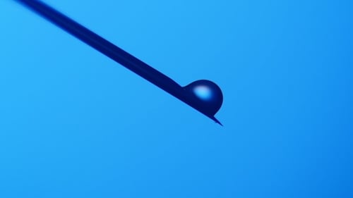 Syringe Needle with Droplet Extreme Close Up