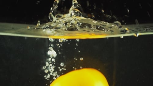 Tomato Falling into the Water