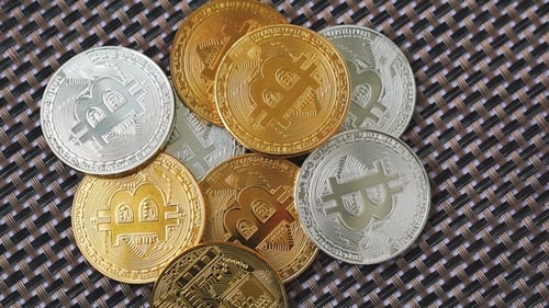 Gold and Silver Bitcoin Cryptocurrency Coins Close Up