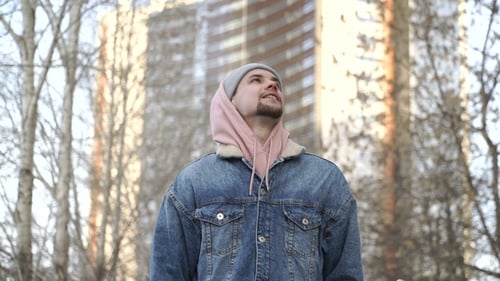 Man Is Taking a Walk Outside