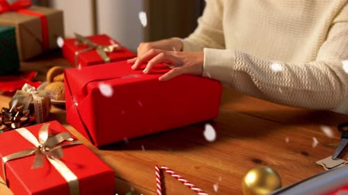Wrapping Christmas Gift with Festive Holiday Decorations