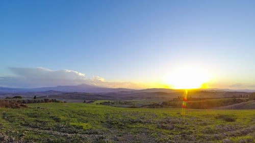 Sunset over the Tuscany Fields