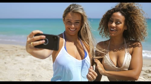 Cheerful Diverse Women Taking Selfie on Beach