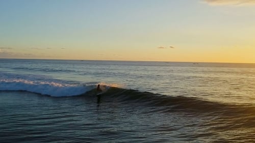 Surfing: Surfer Woman Riding on the Blue Waves