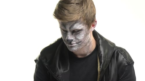 Young Man with Wolf Make-up Close Up