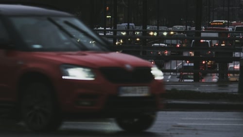 Busy Split Level Junction of the Multi-lane Roadways at Night