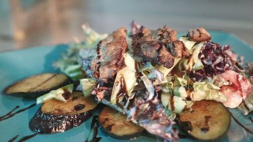 Close Up of Fresh Salad with Grilled Meat