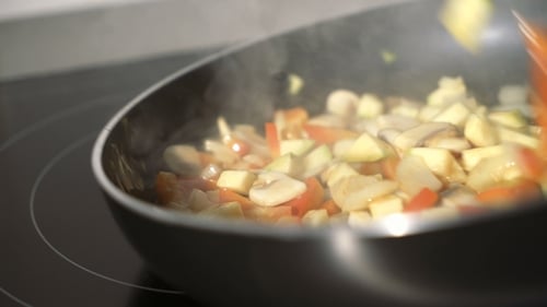 Man Cooking Vegetable Stew