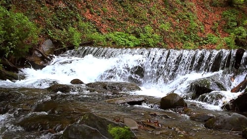 Mountain Waterfall in Deep Forest