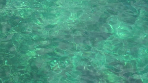 Turquoise Ocean Water Shimmers in Sunlight