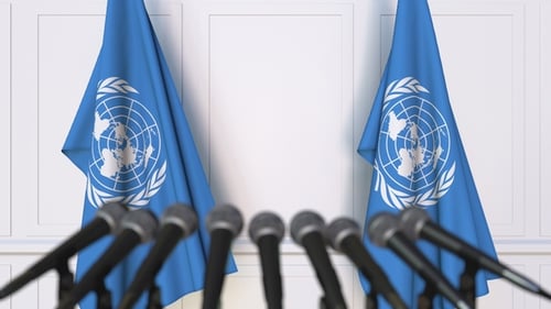 The United Nations Official Press Conference Featuring Flags of the UN