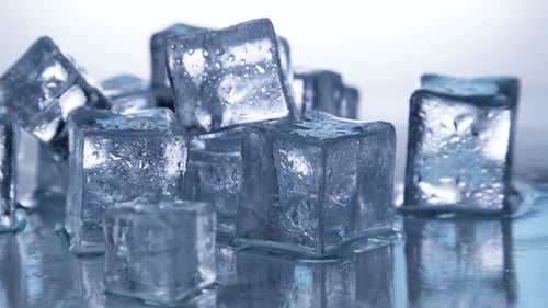 Close Up of Clear Ice Cubes Melting
