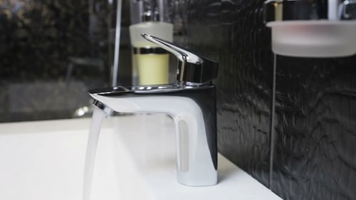 Water Faucet in a Luxurious Hotel Room or at Home