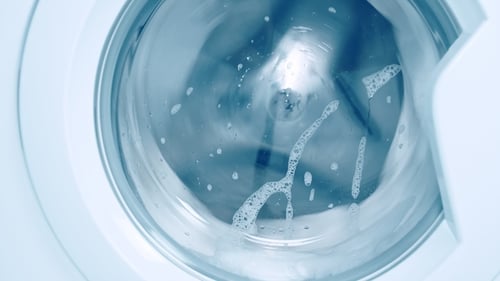 Washing Machine Cleans with Foamy Water
