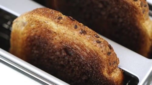 Burnt Toast in a Stainless Steel Toaster