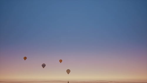 Balloons Over Clear Ocean