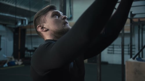 Man Training with Weight Ball