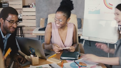 Multi Ethnic Team Discussing Creative Strategy Plans. Happy Smiling Office Employees Generate Ideas