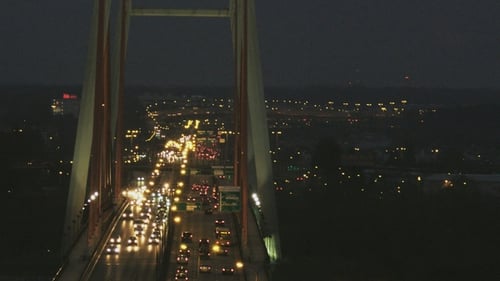 Vehicles Moving Slowly through a Bridge