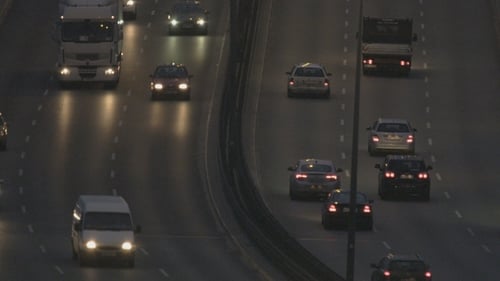 Cars Moving Slowly through a Bridge
