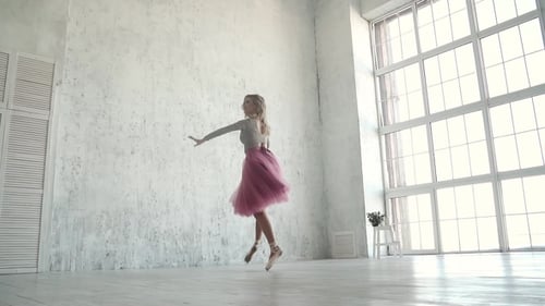 Ballet Dancer Gracefully Dancing in Studio