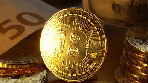 Bitcoin Cryptocurrency Coins with Bank Notes, Close Up