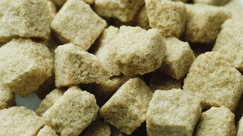 Lots of Brown Sugar Cubes Are Rotating