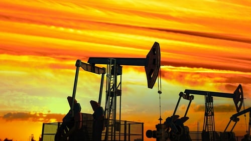 Working Oil Pumps Silhouette at Golden Sunset