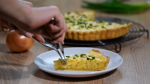 Cutting a Slice of Savory Onion Pie