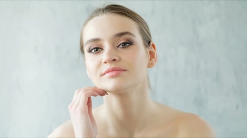 Glamorous Young Woman Posing for Beauty Shoot